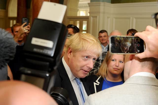 Boris Johnson at The Queen's Hotel in Southsea on Thursday, June 2, with Donna Jones, right. Picture: Sarah Standing (270619-1827)