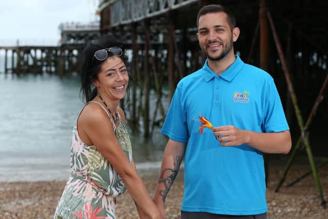 Abigail Godley was swimming near South Parade Pier when she started to drown. Her life was saved by Ricardo Formiga who is pictured with her at the pier.        Picture: Chris Moorhouse     (260719-00)