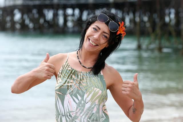 Abigail Godley is all thumbs up after having been saved.    Picture: Chris Moorhouse     (260719-06)