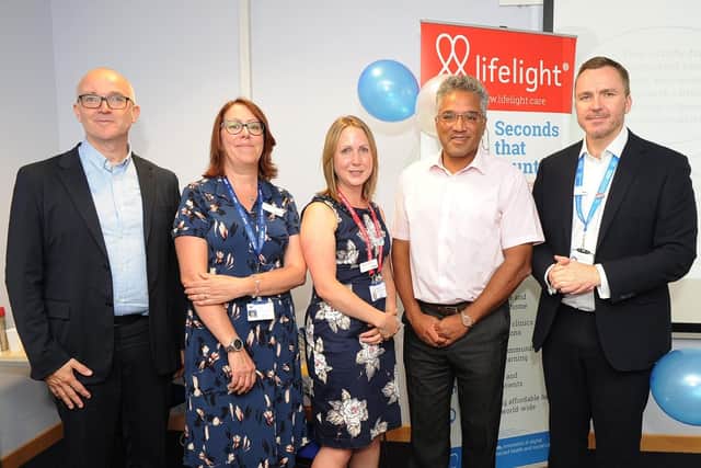 From left, Laurence Pearce, CEO of Xim; Sharon McCready, trust lead research nurse; Emily Heiden, research fellow; Professor Anoop Chauchan, director of research and Mark Cubbon, chief executive of Portsmouth Hospitals NHS Trust. Picture: Habibur Rahman