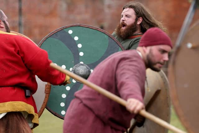 Saxon re-enactors do battle. Invasion! Saxon warriors event at Fort Nelson. Picture: Chris Moorhouse (270719-48)