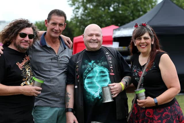 From left, Robbie Robertson, Ralph Eccleston, Mac Dahl and Laura Robertson. Gosport Waterfront Festival, Walpole Park, Gosport. Picture: Chris Moorhouse (270719-70)