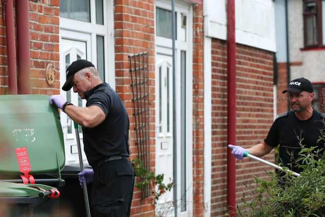 Police searching near the scene of the house fire in Grange Crescent, Gosport. Picture: Chris Moorhouse (310719-86)