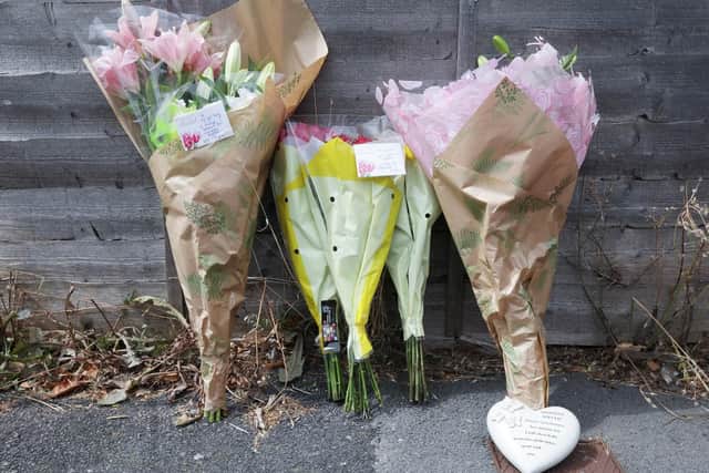 Floral tributes laid near the scene of the house fire in Grange Crescent, Gosport. Picture: Chris Moorhouse (310719-91)