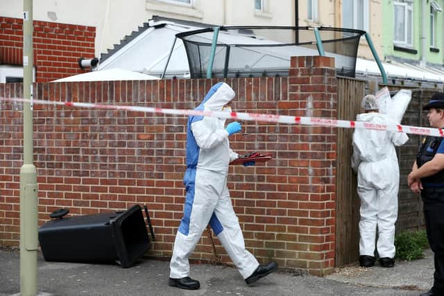 Forensics at the scene. Aftermath of fire at Grange Crescent, Gosport. Picture: Chris Moorhouse     (310719-83)