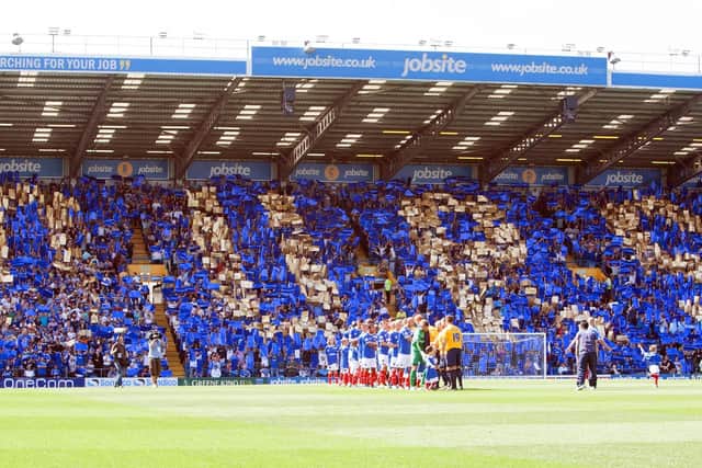 Pompey fans celebrate ownership of the club. Picture: Joe Pepler