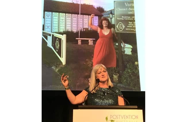 Anna Wardley talking about her endurance swims and the loss of her dad to suicide at the Australian Suicide Postvention Conference in Sydney in June 2019 as part of her Churchill Fellowship travels. The shot in the red dress was taken after she swam the English Channel in 2009 to raise funds for the Samaritans.