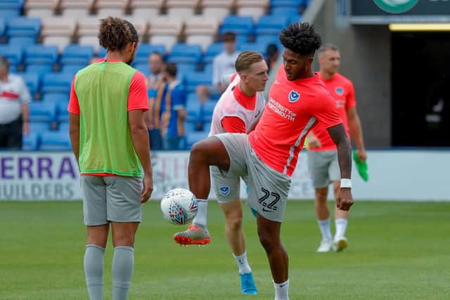 Portsmouth forward Ellis Harrison (22) warming up