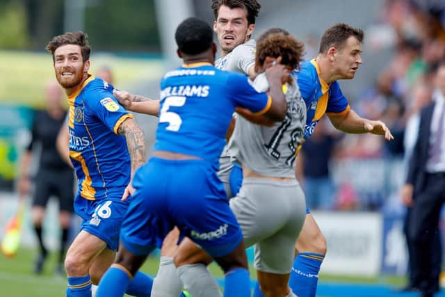 Portsmouth forward John Marquis (10) in action