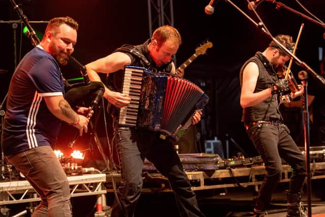 Treacherous Orchestra perform on The Village Stage. Picture: Vernon Nash (040819-016)
