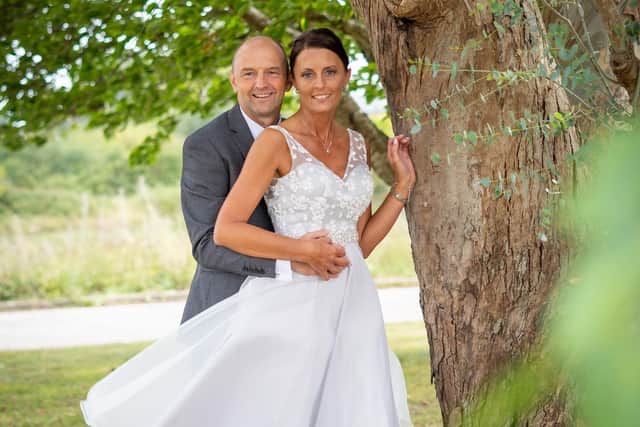 The happy couple pose for pictures. Picture: Carla Mortimer Photography.