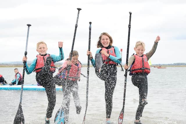 Making a splash, l to r, Rick Griffiths, 10, Hannah Griffiths, 8, from Emsworth, Eliza Sharp, 11, from Fareham, and Declan Paul, 8, from Havant.

Picture: Sarah Standing
