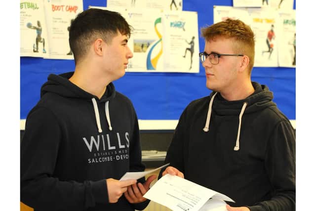 Isaac Ross (right) with fellow A-level student Edward Lowe when they collected their results at St Vincent College, Gosport last year
