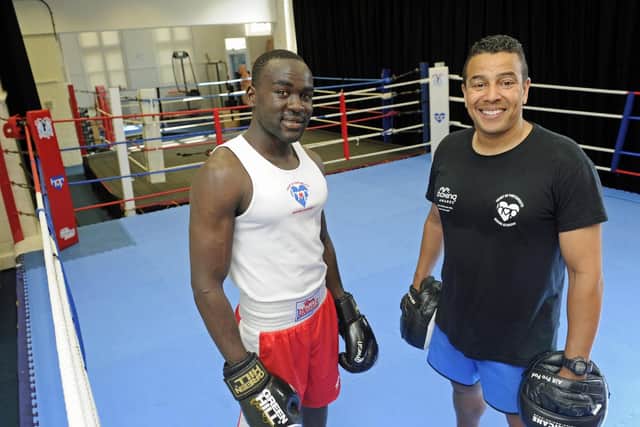 Ahmed Adenas with his coach Q Shillingford

Picture: Ian Hargreaves  (270819-12)