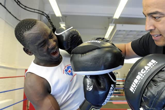 Q Shillingford with Ahmed Adenas at Heart Of Portsmouth Boxing Academy. 

Picture: Ian Hargreaves  (270819-13)