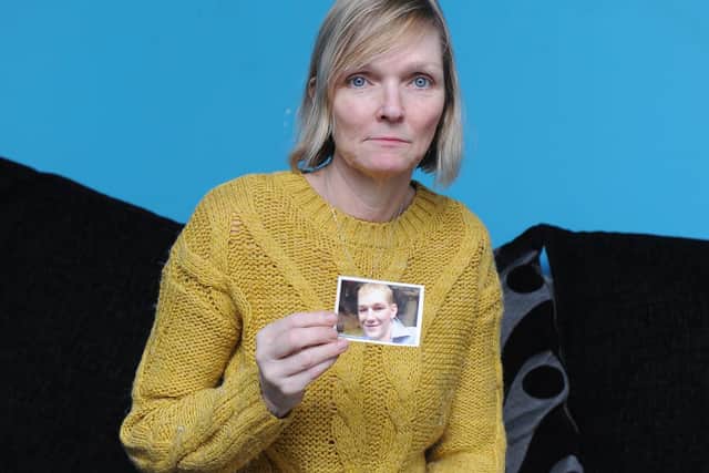 15/3/19    

STORY: Hilary Mills' son Ben died of drugs (went into cardiac arrest week before Mutiny last year)  and he was a recovering addict.

Pictured:   Hilary Mills with a picture of her son, Ben Mills

Picture: Habibur Rahman