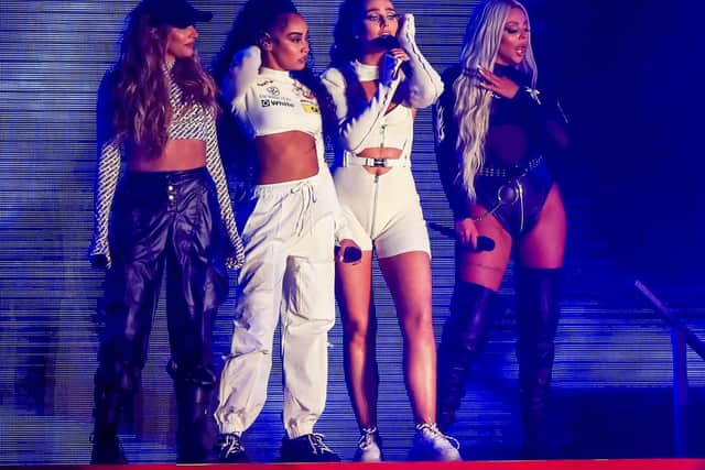 Little Mix performing on stage. Picture: Peter Byrne/PA Wire