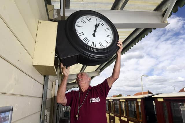 Pictured:  Bob Haddock putting up the station clock. Roger Arbon/Solent News & Photo Agency
UK +44 (0) 2380 458800