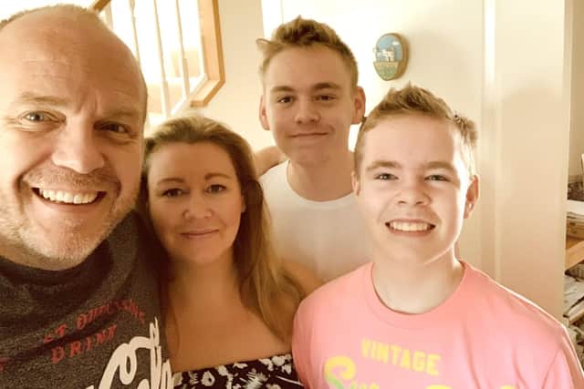 James Alderson with his wife and children