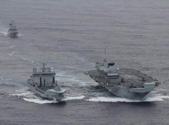 HMS Queen Elizabeth, right, with HMS Dragon and RFA Tideforce on the eastern seaboard. Picture: Royal Navy/@HMSQNLZ