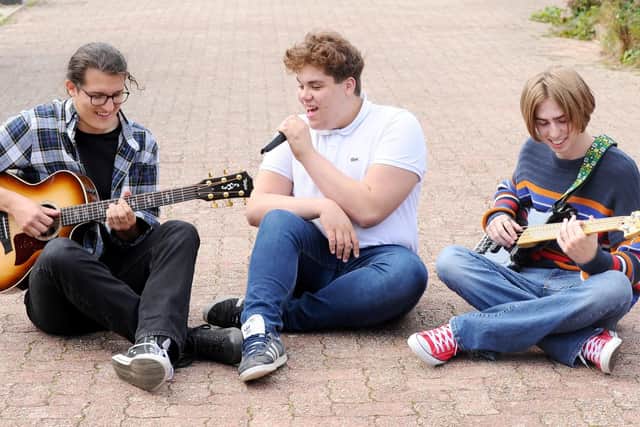 Milo Baker (middle),17,  with Cameron Soper (left), 20,  and Kieran Poling, 17, who are performing a concert in memory of Milo's uncle Gary George who died from leukaemia.

Picture: Sarah Standing