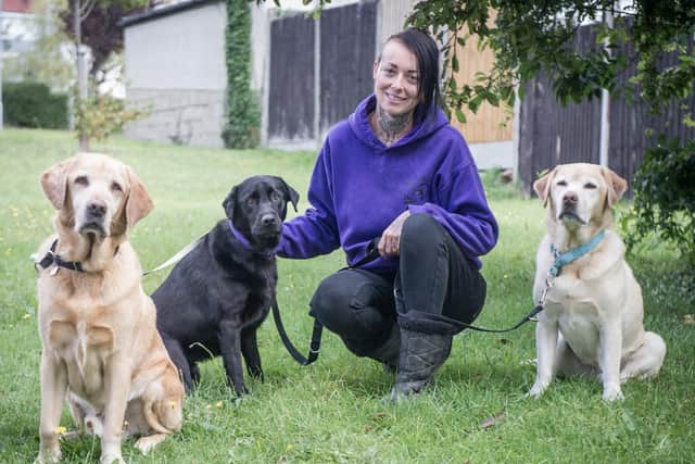 Beth Roy, owner of the now-destroyed husky Mika, with three of her other dogs, Suki, Hunter and Winnie. Picture: Habibur Rahman