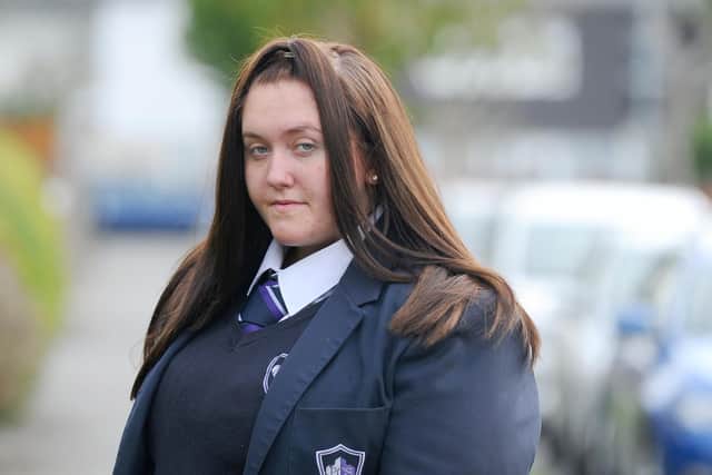 Portchester Community School's regulation uniform doesn't fit Year 10 student Kada Jones (14). Instead, her mum had to buy a size 24-26 elasticated skirt from Aldi - as close to the uniform requirements as she could. But the school is having none of it, giving the ultimatum sitting Kada in isolation, or not coming in at all. Picture: Sarah Standing (100919-7287)