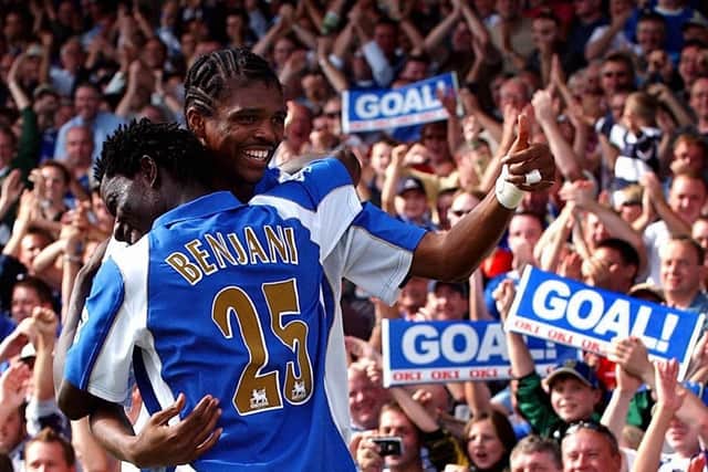 Kanu and Benjani celebrate another Pompey goal