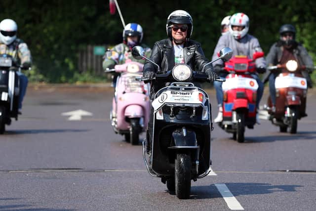 Lorraine Marshall, front. Vespa rally for Lorraine Marshall of Eastney, who is terminally ill. Pictured at Sainbury's Farlington.
Picture: Chris Moorhouse (180819-28)