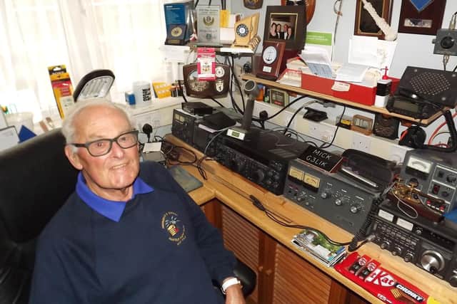 Mick Puttick with his home radio and telegraph equipment.