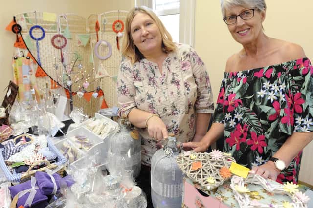 A bowel cancer fair to raise money for research has been held at The Church of the Resurrection in Drayton. From left, Bev McQuire with Jayne Evans. Picture: Ian Hargreaves  (140919-3)
