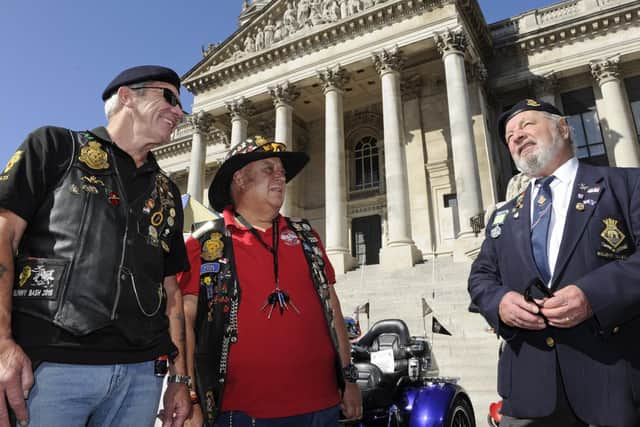 The Pompey Pals charity has held it's fourth annual commemoration in Guildhall Square including a remembrance service at Portsmouths war Memorial. From left, motorcycling veterans, Ian Kane and Colin Burns with George "Wacker" Payne. Picture: Ian Hargreaves  (140919-2)
