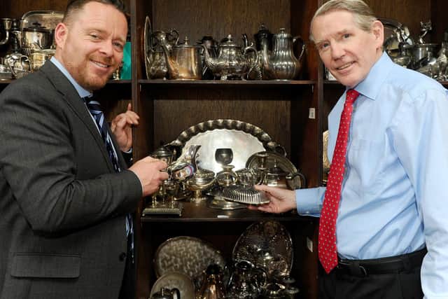 Managing director and auctioneer John Cameron, left, and co-owner David Nesbit at Nesbits in Southsea in June before the first silver auction for Rowans Hospice 
Picture: Sarah Standing (200619-1292)