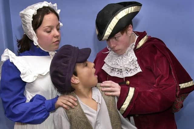 Heidi Smith as Widow Corney, Brendan Brophy as Oliver and Tyler Davis-Smith playing Mr Bumble, rehearsing for their production of 'Oliver' at Mayfield School in 2003