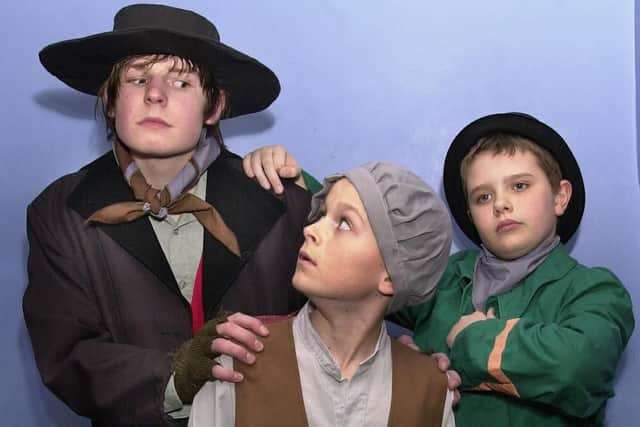 Kris Watts as Fagin and Michael Pratt as Oliver and Rowan Bastable as Artful Dodger,  rehearsing for their production of 'Oliver' at Mayfield School in 2003
