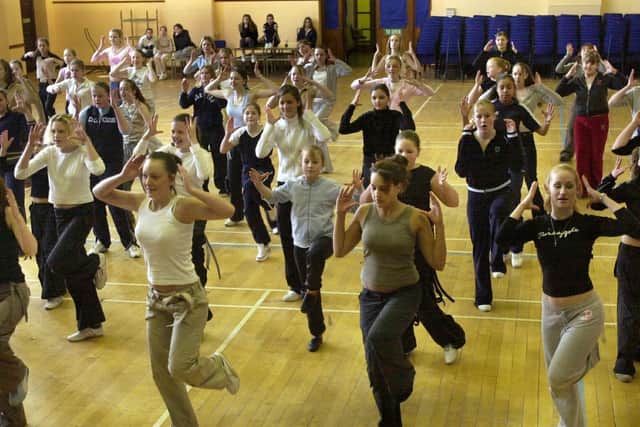 Students at Mayfield School rehearsing their routines for Rock Challenge event in 2003.