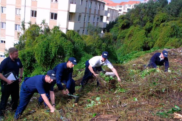 Police search teams in Gibraltar on 21 January 2003 looking for the body of sailor Simon Parkes believed to have been murdered by Allan Grimson.