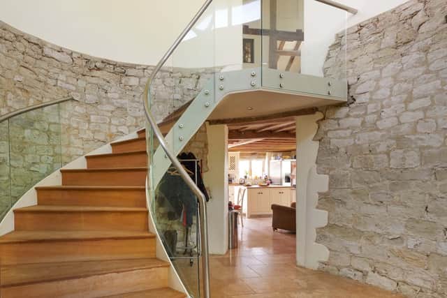 Inside the 4m Oast House mansion in Hampshire - a staircase in the property.