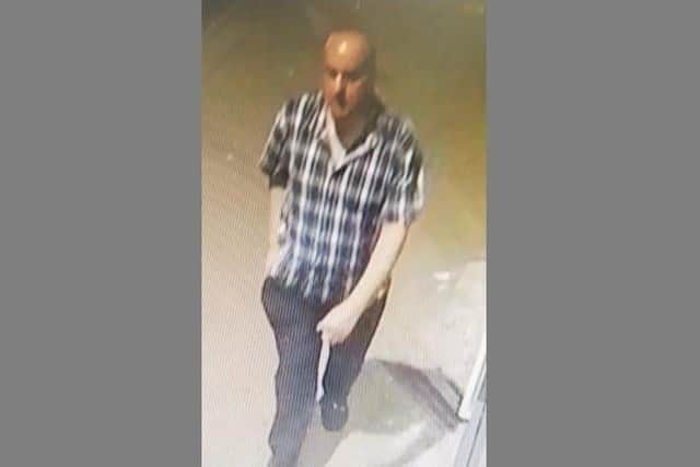 Police want to speak to this man after arsons at the rear of two charity shops, including the British Heart Foundation Charity Shop in London Road, North End, and Naomi House Charity Shop in London Road. Picture: Hampshire police