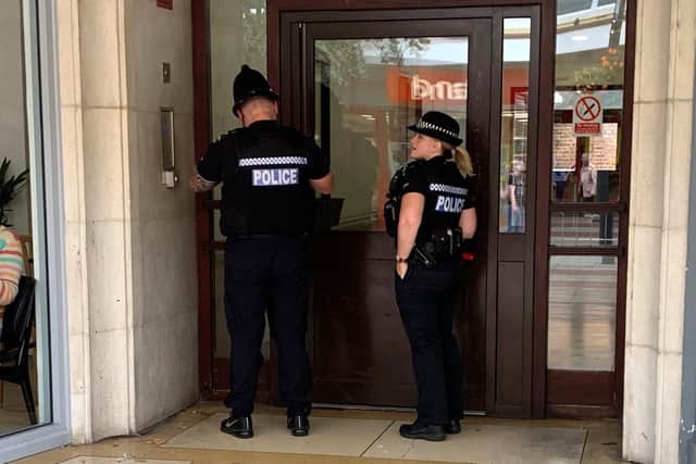 Police entering Palmerston Mansions in Palmerston Road, Southsea, on September 17 after a womans body was found on a flat roof overlooking Tonbridge Street.