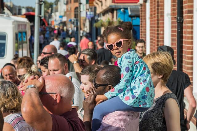 Ella, three, on her dad's shoulders for a better view at the Fratton Family Festival. Picture: Mike Cooter