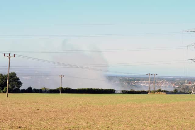 Smoke billowing up from the Veolia waste transfer station.  
Picture: Sarah Standing (170919-7568)