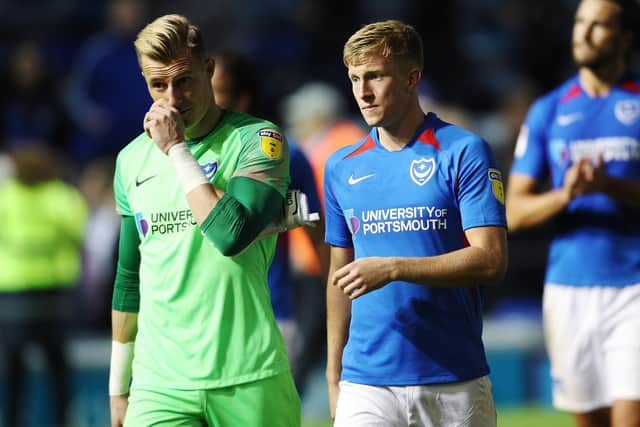 Craig MacGillivray, left, and Ross McCrorie dejected after the draw with Burton. Picture: Joe Pepler