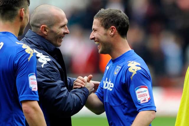 Pompey boss Michael Appleton congratulates David Norris following his dramatic St Mary's leveller. Picture: Allan Hutchings