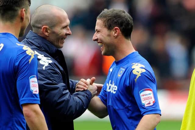 Pompey boss Michael Appleton congratulates David Norris following his dramatic St Mary's leveller. Picture: Allan Hutchings