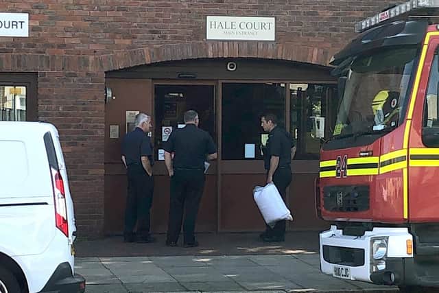 Investigators from Hampshire Fire and Rescue pictured entering Hale Court, in Fratton Road, Fratton, following a fatal blaze at a ground floor flat on Wednesday morning which claimed the life of a man in his 70s.