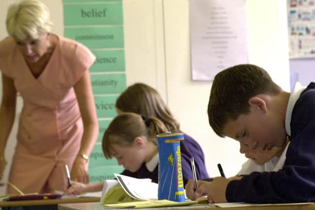 St Luke's pupils hard at work in 2000 during an RE class under the guidance of their teacher Sue Whewell