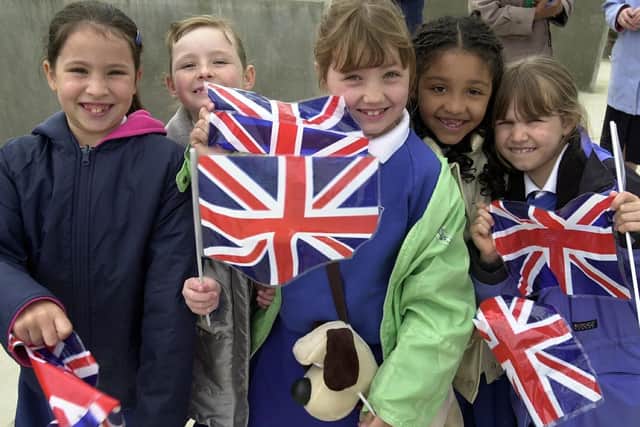 St Luke's School students (left) Amie Gissing, Dannielle Arnold, Elissa Churchill, Shakira McGeady and Phillippa Draper all from St Lukes School waiting for HRH Prince Andrew on the Millennium Promenade, Old Portsmouth in 2001