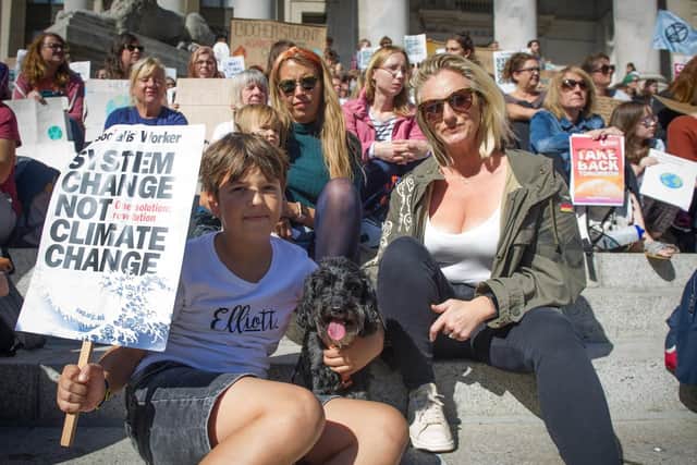 Elliott Murray 11, Jennifer Murray, Alba Channer 1, Maria Hayden and Charlie the dog on the Guildhall steps. Picture: Habibur Rahman