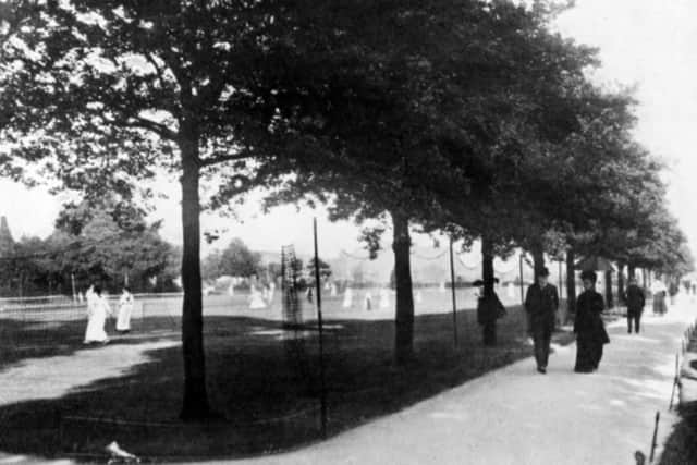 Apart from the dress code of the period this scene at Pembroke Gardens, Pembroke Road, Old Portsmouth, is almost unchanged to this day.  Picture: Barry Cox postcard collection